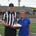 Dr. Heather Gulgin Hands Over the Game Ball